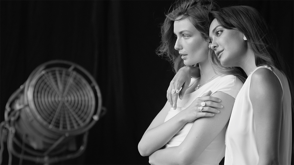 Andreaa Diaconu and Lisa Haydon on set